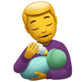 homme allaitant un bébé