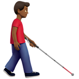 homme avec canne blanche : peau mate et vers la droite