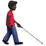 homme avec canne blanche : peau foncée et vers la droite