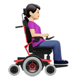 femme en fauteuil motorisé : peau claire et vers la droite