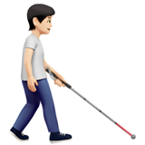 personne avec une canne blanche : peau claire et vers la droite